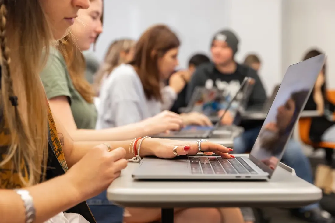 People working on computers.